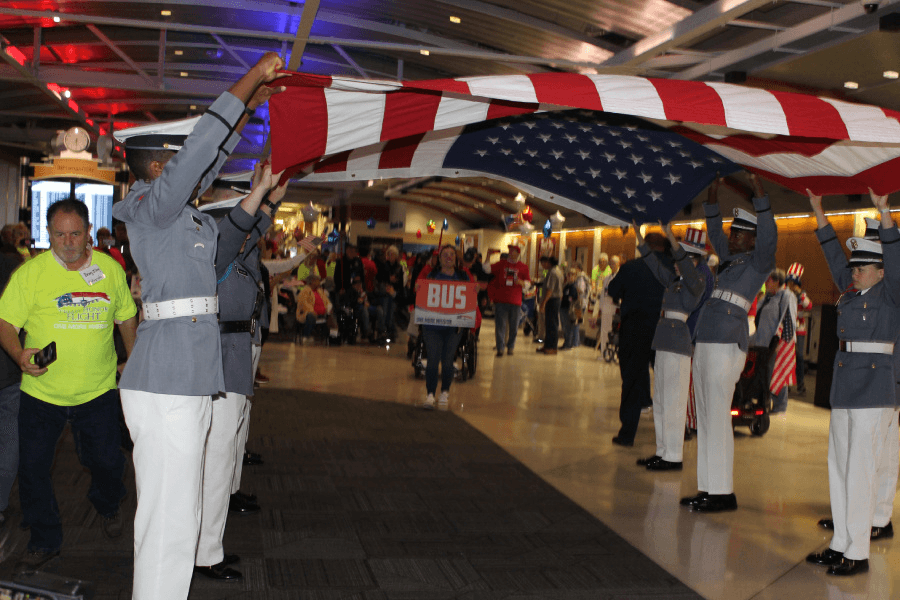 Cadets holding flag up